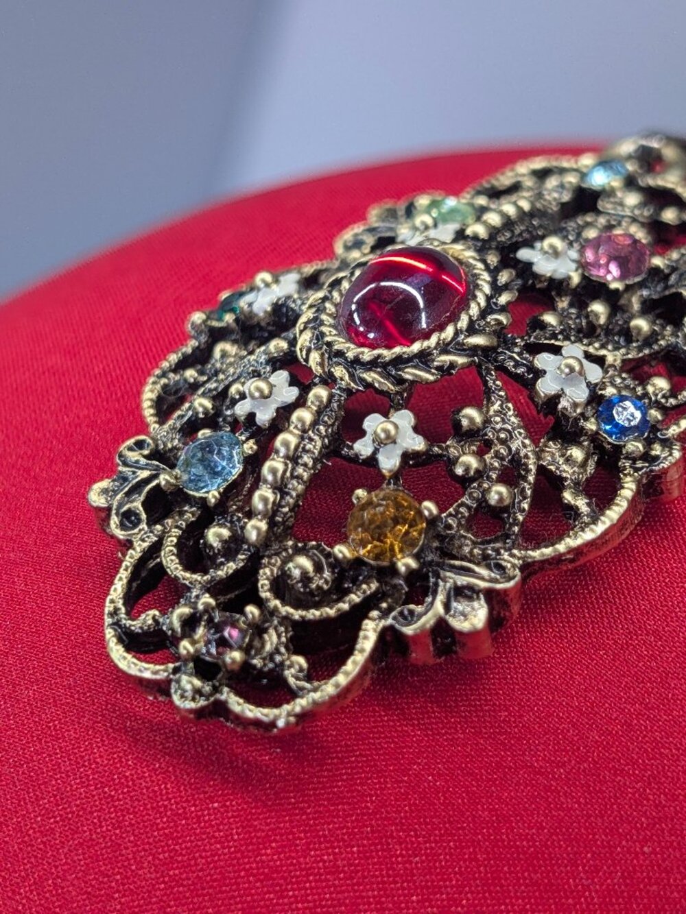 Vintage Ornate Filigree Pendant – Rhinestones, Red Cabochon & Enamel Flowers